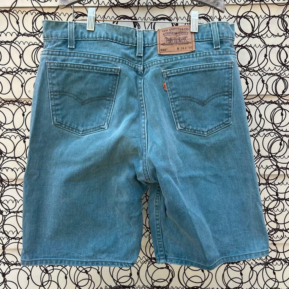 Vintage Levi’s 550 gray green orange tab jean shorts Size 34